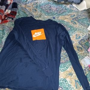 Blue and orange nike shirt